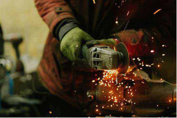 Mechanic preparing oil